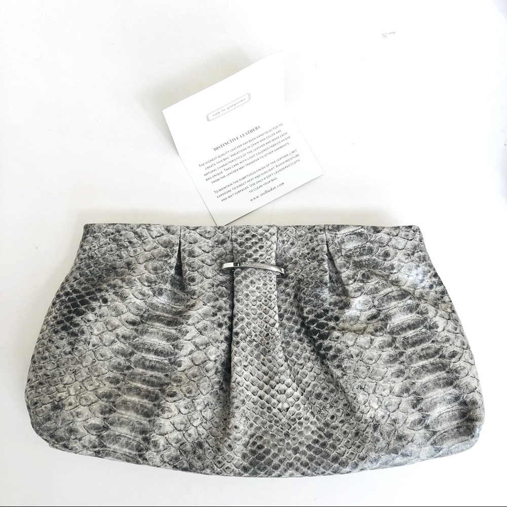 NWT Stella & Dot Leather Clutch With Dust Bag. New, Never Used.